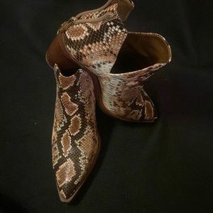 Women’s size 8 Vince Camuto bibestie multi color ankle booties.